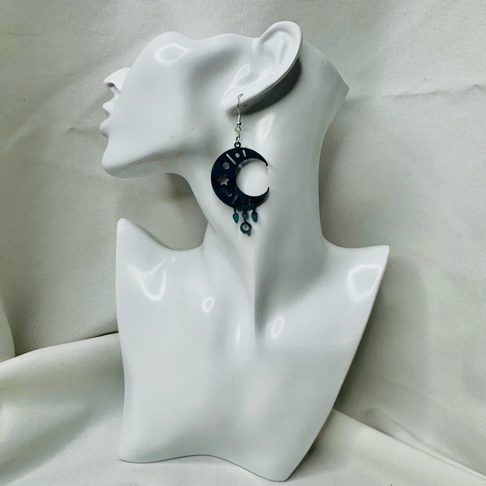Hand dyed leather earrings moon with star cutout in blues and teal - Picture 3 of 5